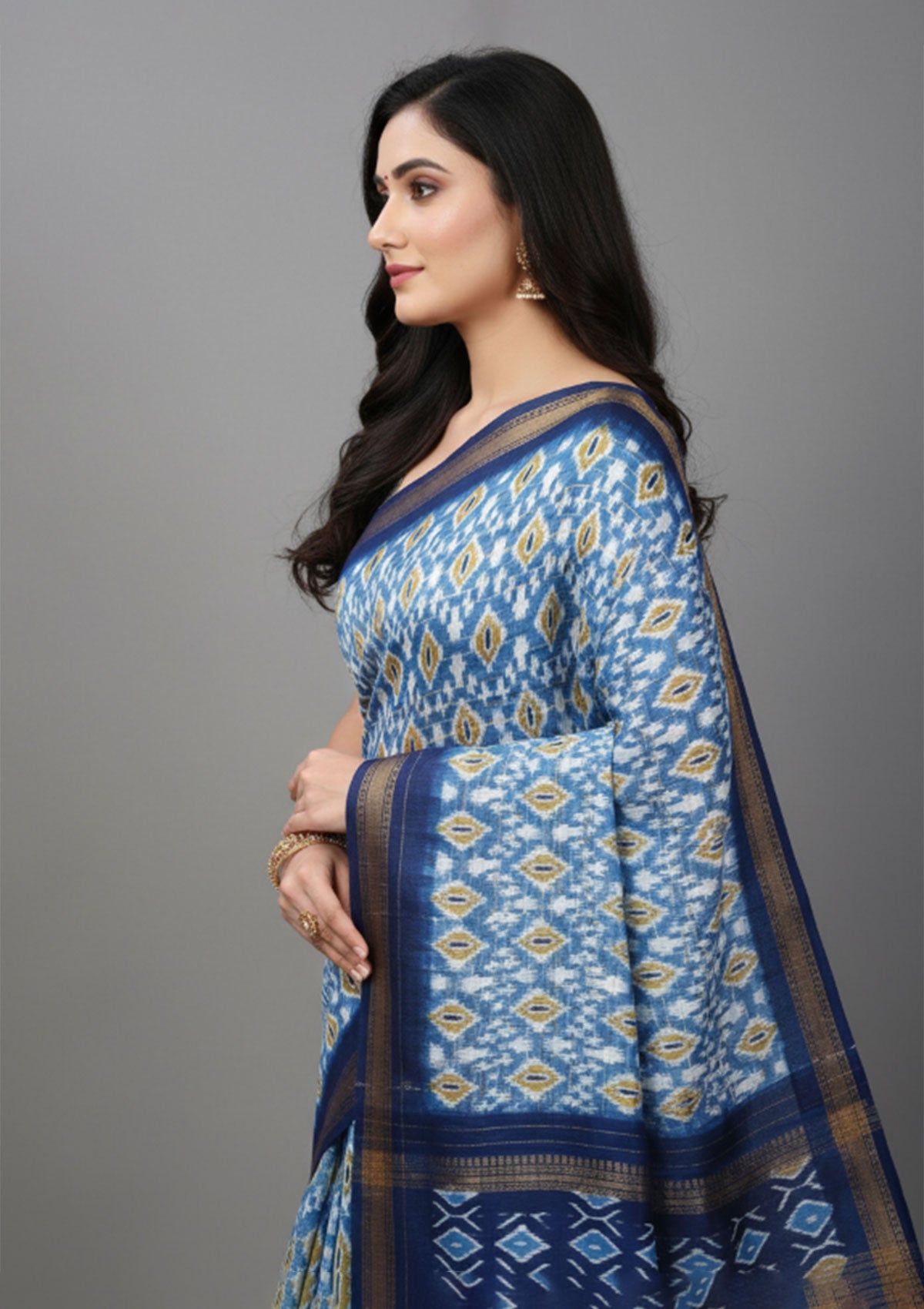 Premium Kesar Pista Blue Ikat Saree with Gold Diamond Motifs | Handwoven Cotton-Silk Blend