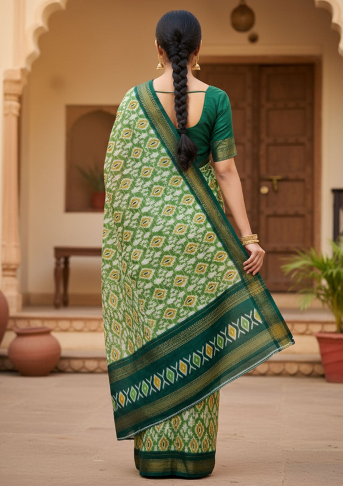 Premium Green Ikat Saree with Gold & White Diamond Motifs