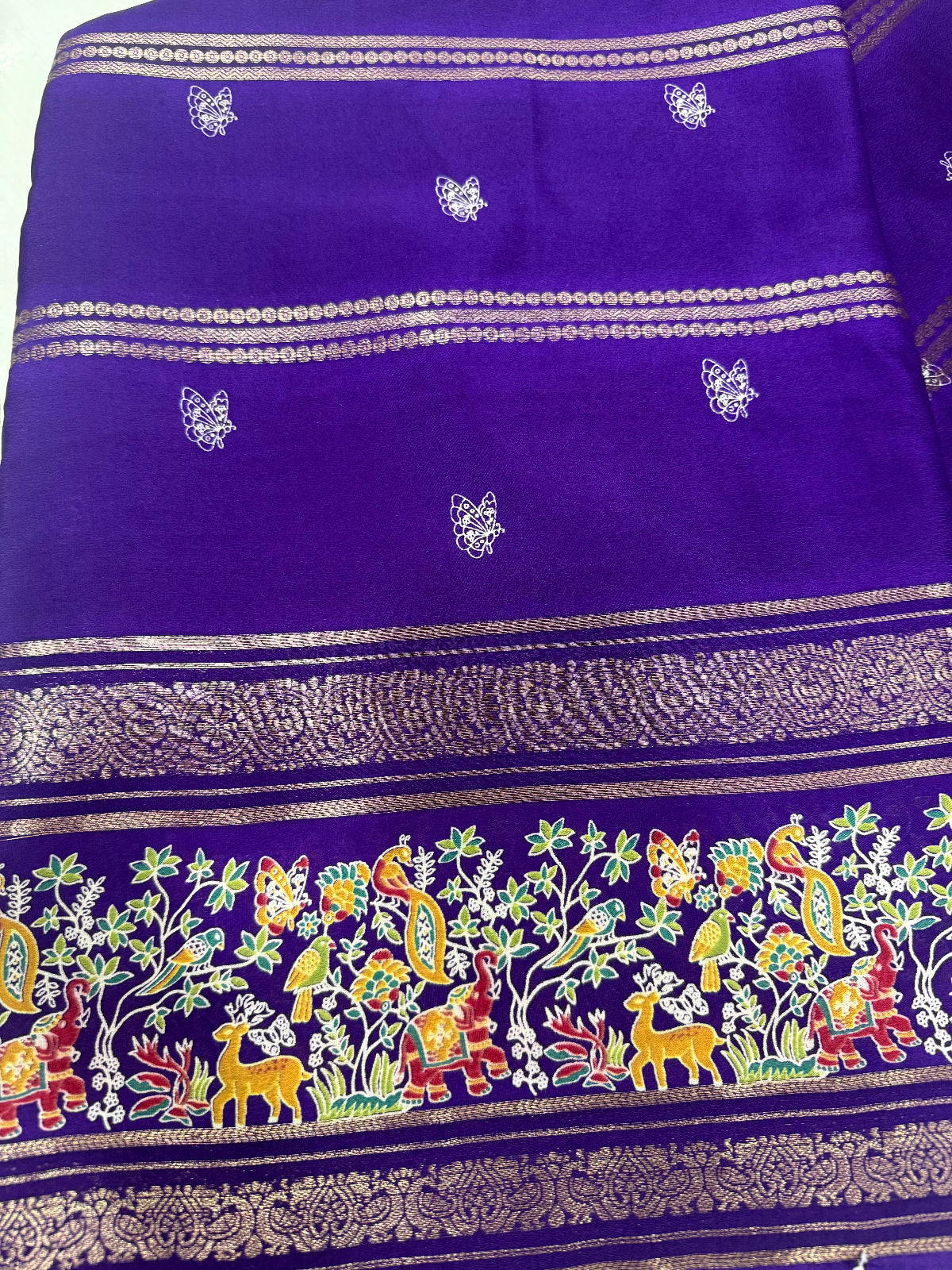 Exquisite Nature-Inspired Soft Silk Saree with Wildlife Border & Butterfly Buttas