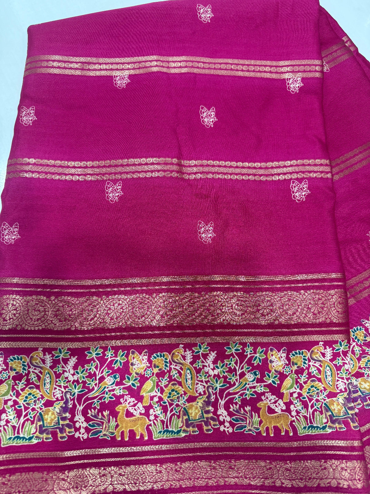 Exquisite Nature-Inspired Soft Silk Saree with Wildlife Border & Butterfly Buttas