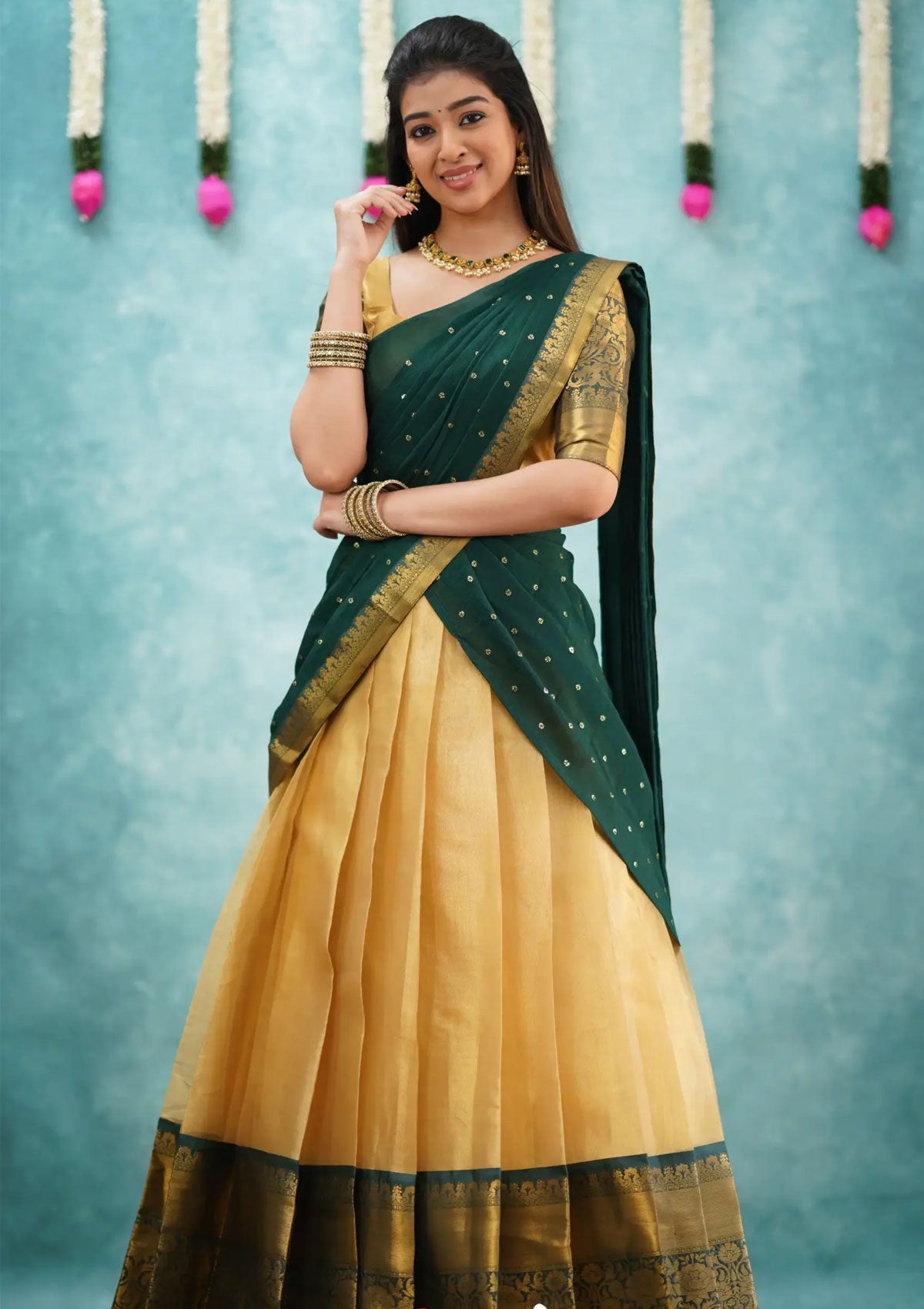 Izhaiyini Dark Bottle Green Shade and Gold tone Organza Halfsaree